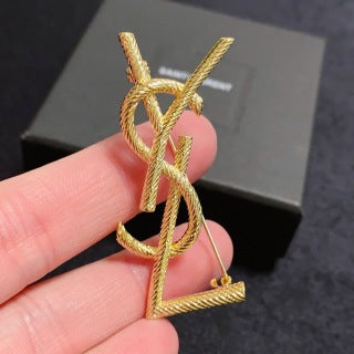 YSL Golden Cassandre Rope Monogram Brooch